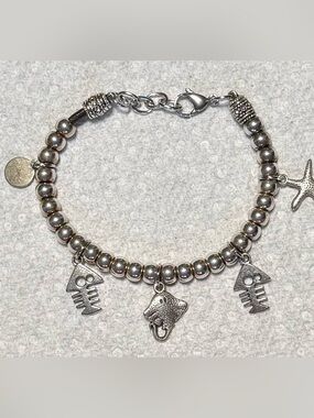 Silver Beaded Charm Bracelet.